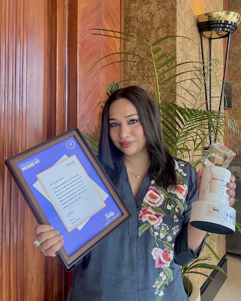 Surabhi Dewra, Founder & CEO of CareerGuide.com, holding the MSME Wonder Women award, 2024